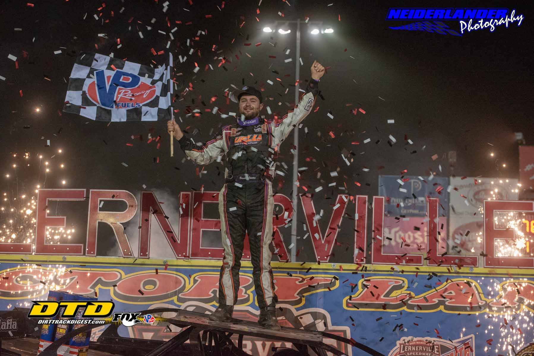 Driver Brandon Overton celebrating winning a big race.